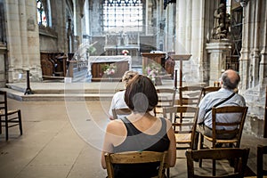 People praying inside a church