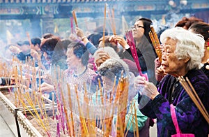 People Praying at Temple