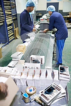 People, printing factory and paper production or manufacturing process for flyer, newspaper or publishing. Men, teamwork