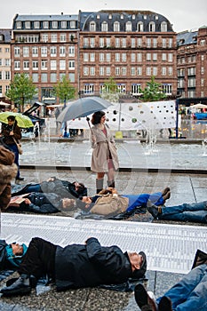 People protesting manifestation die-in against immigration policy and border management