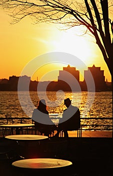 People relaxing at sunset Hudson River
