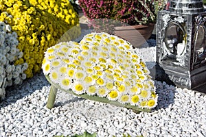 People remembering their loved ones who died; on the cemetery