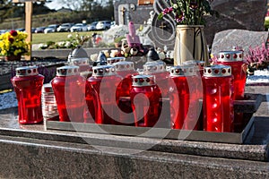 People remembering their loved ones who died; on the cemetery