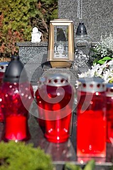 People remembering their loved ones who died; on the cemetery