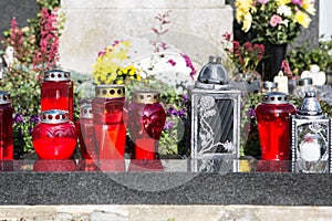 People remembering their loved ones who died; on the cemetery