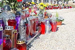 People remembering their loved ones who died; on the cemetery