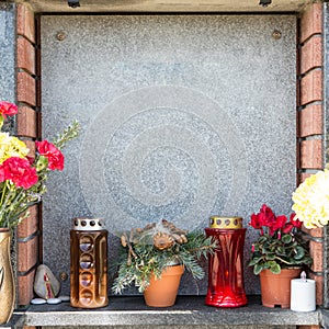 People remembering their loved ones who died; on the cemetery