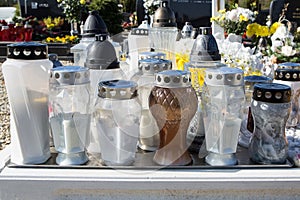 People remembering their loved ones who died; on the cemetery