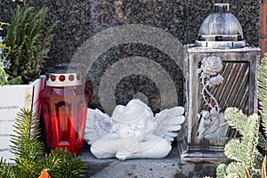 People remembering their loved ones who died; on the cemetery