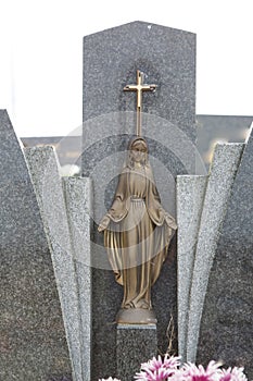 People remembering their loved ones who died; on the cemetery