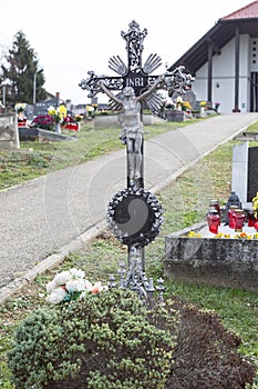 People remembering their loved ones who died on the cemetery