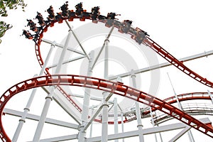 People ride on roller Coaster