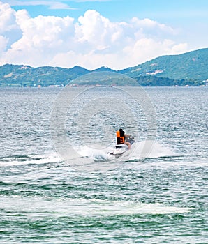 People riding jet ski in the sea