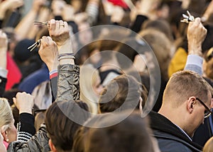 People ringing keys on the demonstration on Prague Wenceslas square against the current government and Babis