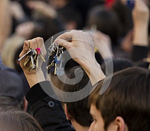 People ringing keys on the demonstration on Prague Wenceslas square against the current government and Babis