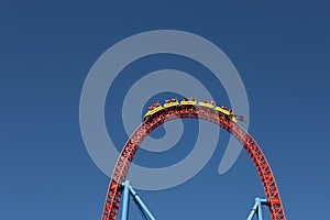 People in roller coaster photo