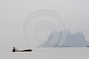 People Rowing Boat