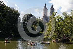 People Rowing Boats in the Lake at Central Park during the Summer in New York City