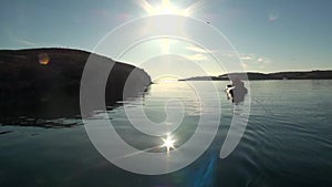 People in a rubber boat in Ocean on New Earth Vaigach.