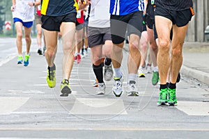 People running in city marathon