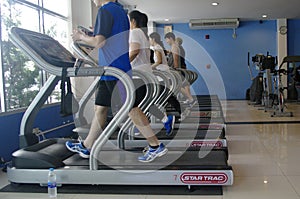 People running at the gym