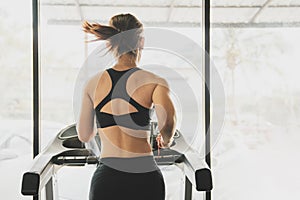 People running in machine treadmill at fitness gym, Young woman workout in gym healthy lifestyle, Young people running on a treadm