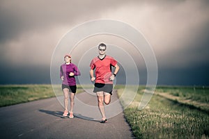 People running training on country road