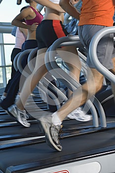 People Running On Treadmill