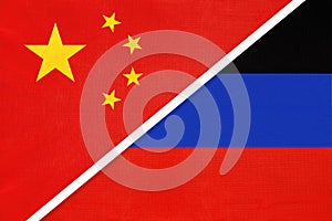 People`s Republic of China or PRC and Donetsk Republic or DNR national flag from textile