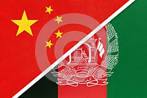 People`s Republic of China or PRC vs Afghanistan national flag from textile. Relationship between two asian countries