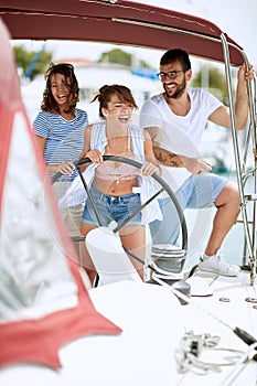 People sailing on a boat at vacation and have fun