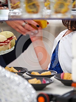 people self serve catering buffet finger food indoor in luxury location in Italy photo