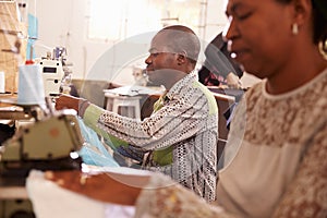 People sewing at a community project workshop, South Africa