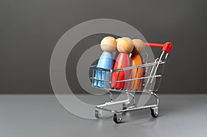 People in a shopping cart. Marketing, consumerism.