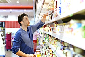 People shopping for food in the supermarket