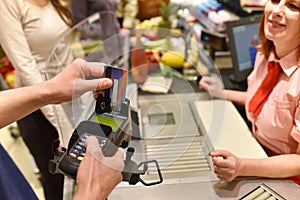 People shopping for food in the supermarket