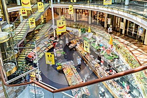 People Shopping For Grocery Food In Supermarket Store Aisle