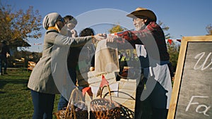 People shopping at local farmers market