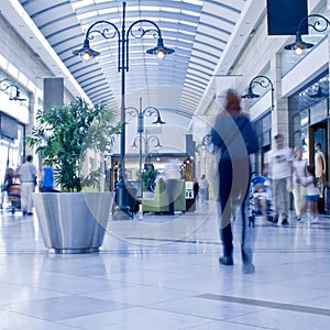 People in shopping mall photo