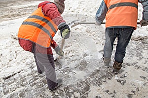 People shoveling snow after a heavy snowfall