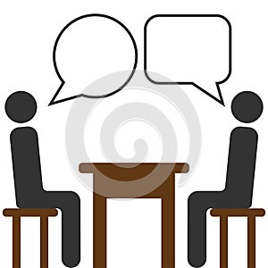 Fun People sitting around the table talking.