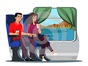 People sitting drinking coffee travelling by train