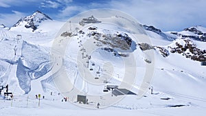 People skiing at the Kleine Matterhorn ski track in the sunny day