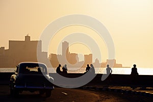 People and skyline of La Habana, Cuba, at sunset