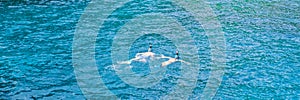 people snorkling in the ocean of Similan Islands Thailand Phangnga