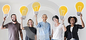 People standing with lightbulb icon
