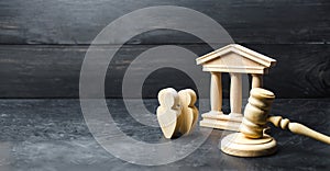 people standing near the house of government and judge`s gavel. concept of the judicial system and the legislature. Courthouse