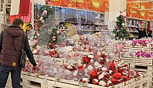 People in the store to buy Christmas decorations