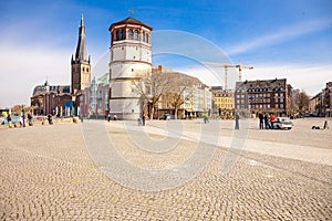 People strolling on Burgplatz in Dusseldorf