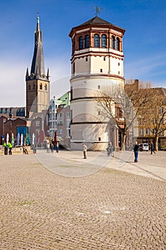 People strolling on Burgplatz in Dusseldorf